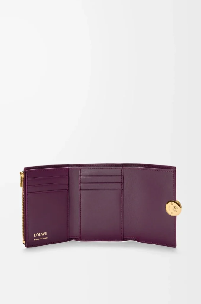 Pebble small vertical wallet in pebble grained calfskin Plum Pebble small vertical wallet in pebble grained calfskin Plum
