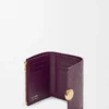 Pebble small vertical wallet in pebble grained calfskin Plum Pebble small vertical wallet in pebble grained calfskin Plum