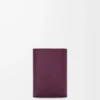 Pebble small vertical wallet in pebble grained calfskin Plum Pebble small vertical wallet in pebble grained calfskin Plum