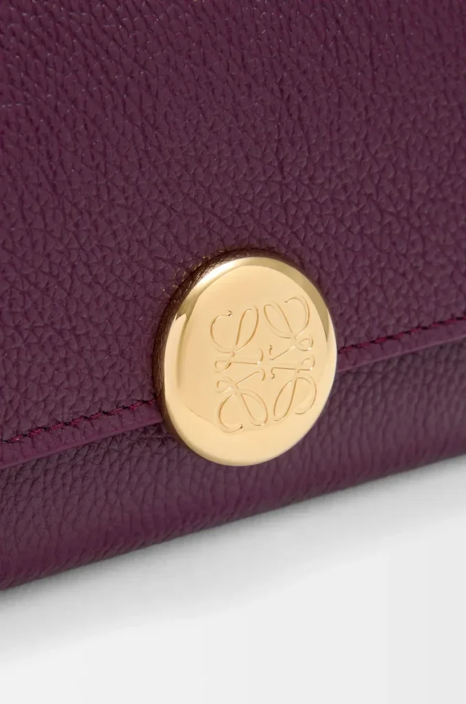 Pebble small vertical wallet in pebble grained calfskin Plum Pebble small vertical wallet in pebble grained calfskin Plum