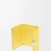 Pebble small vertical wallet in shiny nappa calfskin Baby Corn Pebble small vertical wallet in shiny nappa calfskin Baby Corn
