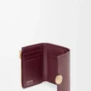Pebble small vertical wallet in shiny nappa calfskin Burgundy Pebble small vertical wallet in shiny nappa calfskin Burgundy