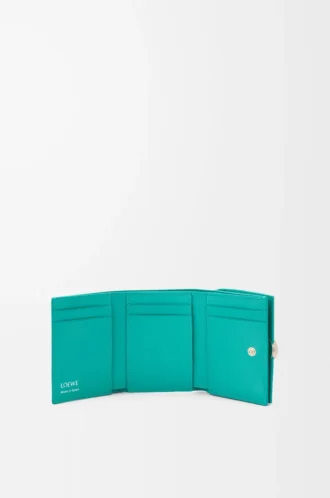 Pebble trifold wallet in pebble grain calfskin Aquamarine