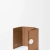 Pebble trifold wallet in pebble grain calfskin Mocha Pebble trifold wallet in pebble grain calfskin Mocha
