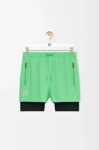 Performance shorts in technical shell Green Performance shorts in technical shell Green
