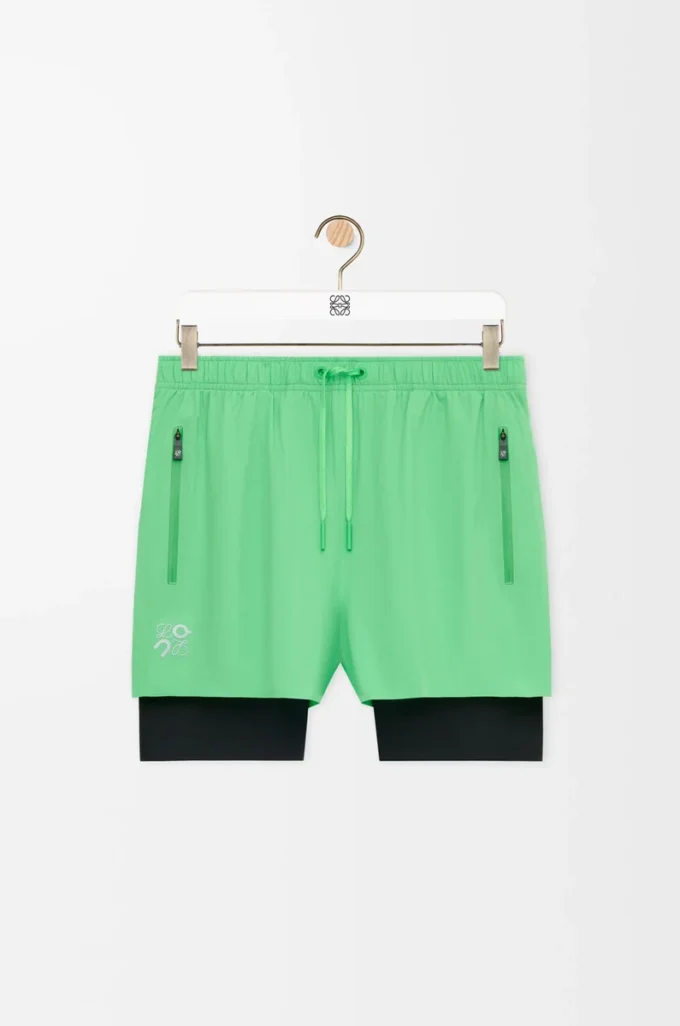 Performance shorts in technical shell Green Performance shorts in technical shell Green