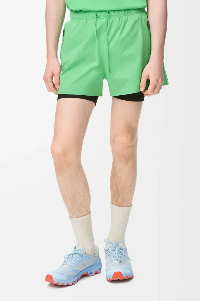Performance shorts in technical shell Green Performance shorts in technical shell Green