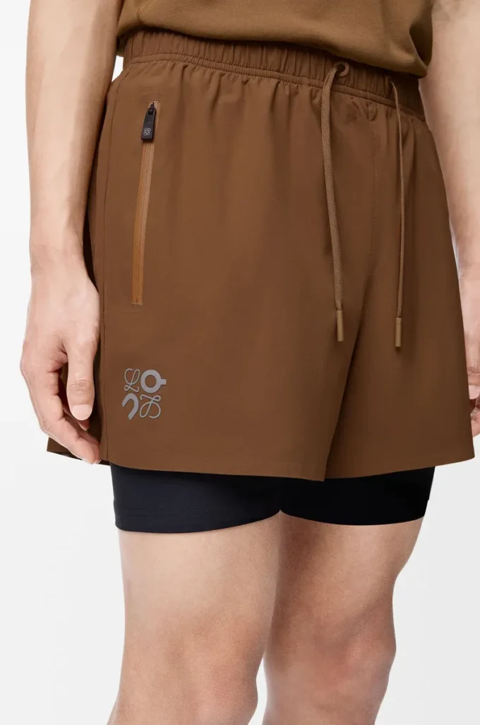 Performance shorts in technical shell Toffee Performance shorts in technical shell Toffee