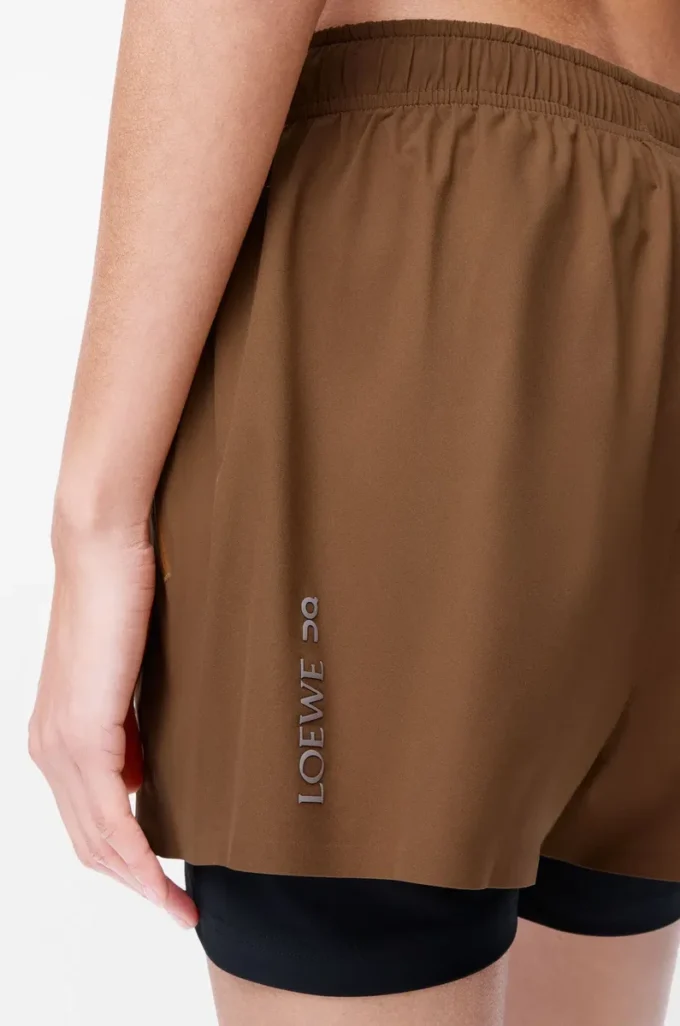 Performance shorts in technical shell Toffee Performance shorts in technical shell Toffee