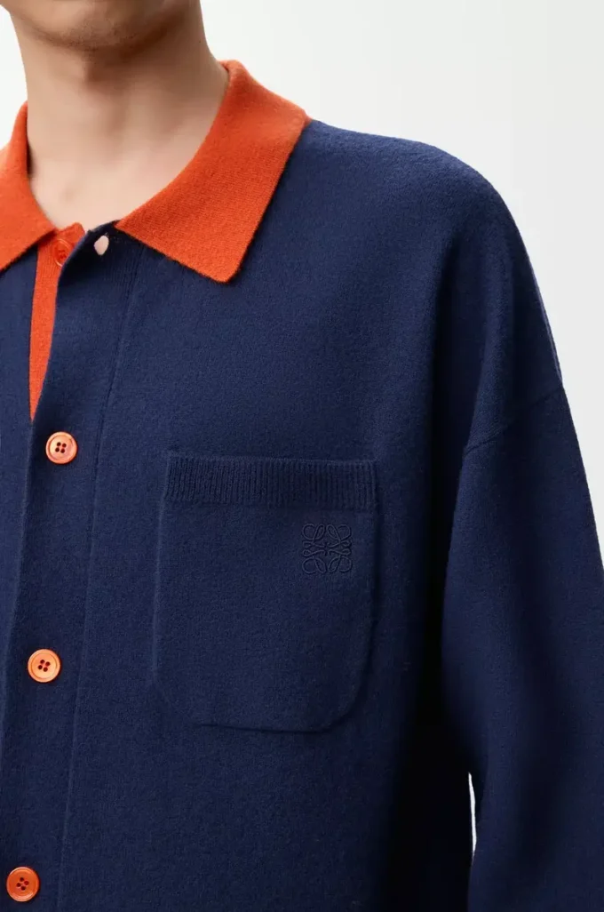 Polo cardigan in wool Navy Blue/Orange Polo cardigan in wool Navy Blue/Orange