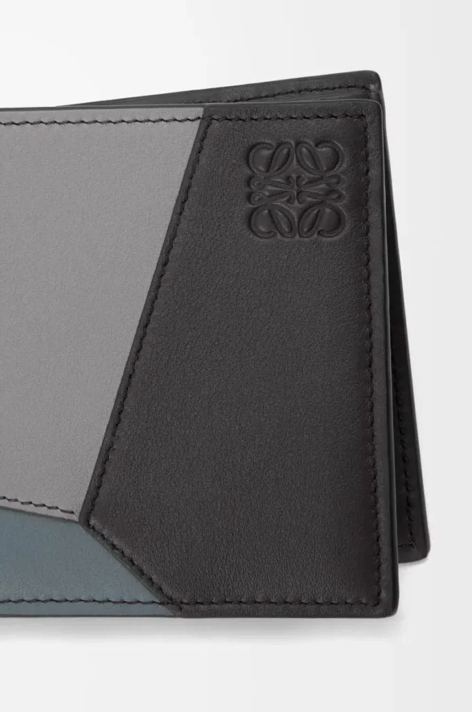Puzzle bifold coin wallet in classic calfskin Asphalt Grey/Storm Blue Puzzle bifold coin wallet in classic calfskin Asphalt Grey/Storm Blue
