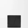 Puzzle bifold coin wallet in classic calfskin Black