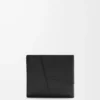 Puzzle bifold coin wallet in classic calfskin Black