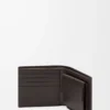 Puzzle bifold coin wallet in classic calfskin Olive/Dark Brown