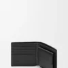Puzzle bifold coin wallet in supple grained calfskin Black Puzzle bifold coin wallet in supple grained calfskin Black