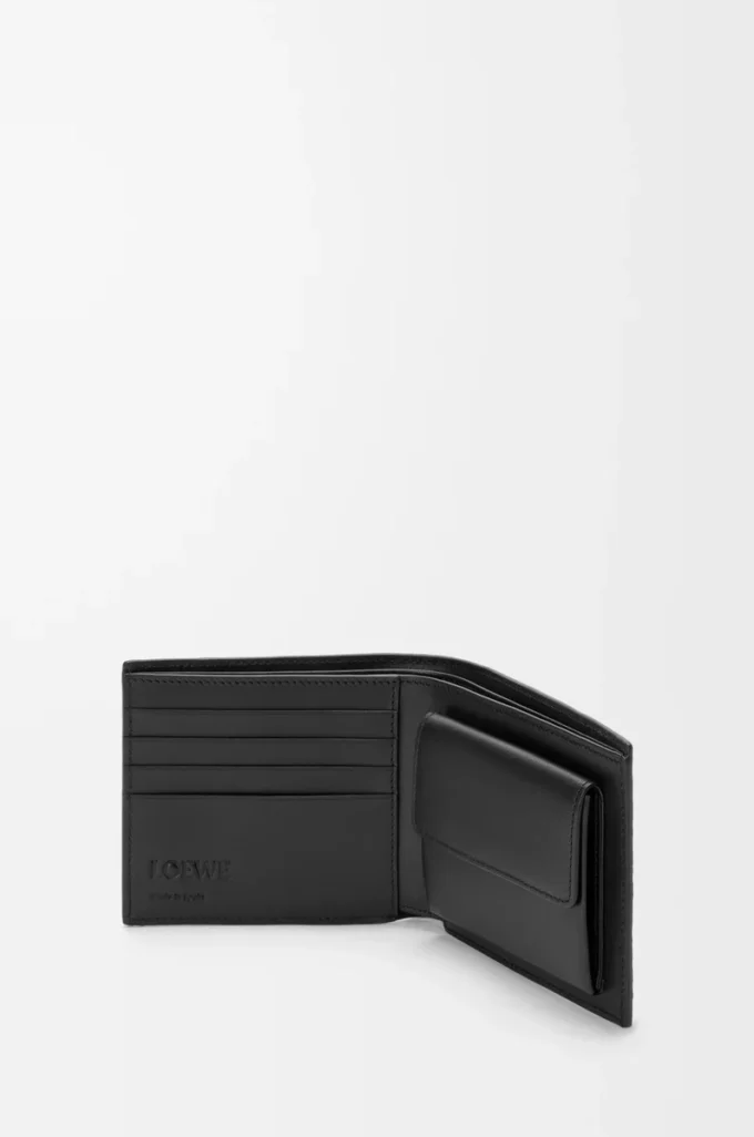 Puzzle bifold coin wallet in supple grained calfskin Black Puzzle bifold coin wallet in supple grained calfskin Black