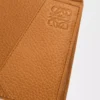 Puzzle bifold coin wallet in supple grained calfskin Light Canyon Brown Puzzle bifold coin wallet in supple grained calfskin Light Canyon Brown