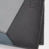 Puzzle bifold wallet in classic calfskin Asphalt Grey/Storm Blue