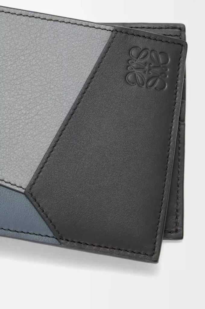 Puzzle bifold wallet in classic calfskin Asphalt Grey/Storm Blue
