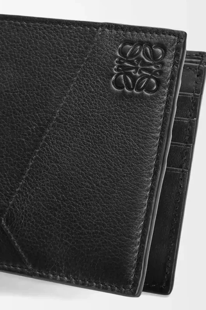 Puzzle bifold wallet in classic calfskin Black