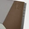 Puzzle bifold wallet in classic calfskin Winter Brown/Ash Grey