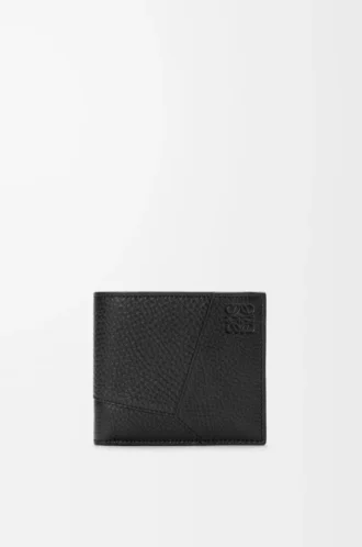 Puzzle bifold wallet in supple grained calfskin Black