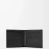 Puzzle bifold wallet in supple grained calfskin Black Puzzle bifold wallet in supple grained calfskin Black