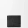 Puzzle bifold wallet in supple grained calfskin Black Puzzle bifold wallet in supple grained calfskin Black