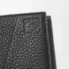 Puzzle bifold wallet in supple grained calfskin Black Puzzle bifold wallet in supple grained calfskin Black