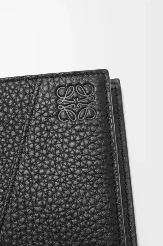 Puzzle bifold wallet in supple grained calfskin Black Puzzle bifold wallet in supple grained calfskin Black