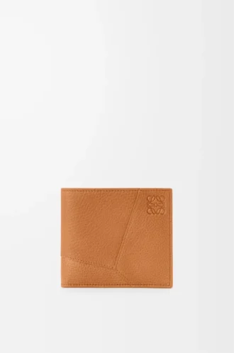 Puzzle bifold wallet in supple grained calfskin Light Canyon Brown