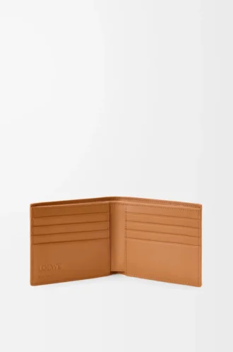 Puzzle bifold wallet in supple grained calfskin Light Canyon Brown