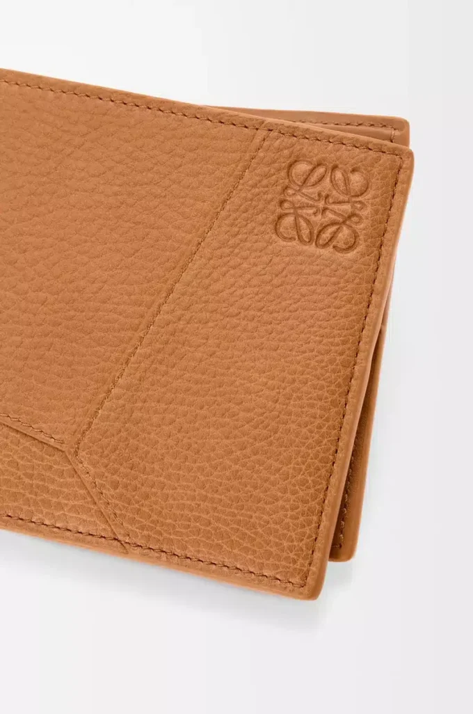 Puzzle bifold wallet in supple grained calfskin Light Canyon Brown Puzzle bifold wallet in supple grained calfskin Light Canyon Brown
