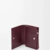 Puzzle compact wallet in classic calfskin Frozen/Dark Burgundy Puzzle compact wallet in classic calfskin Frozen/Dark Burgundy