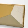 Puzzle compact wallet in classic calfskin Ginger/Sea Salt Puzzle compact wallet in classic calfskin Ginger/Sea Salt