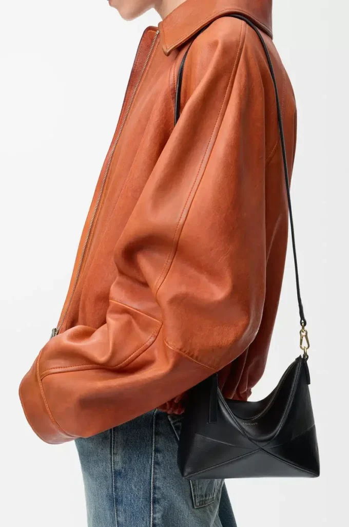 Puzzle Fold pouch in shiny nappa calfskin Black Puzzle Fold pouch in shiny nappa calfskin Black