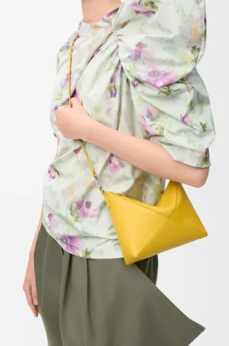 Puzzle Fold pouch in shiny nappa calfskin Dandelion