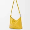 Puzzle Fold pouch in shiny nappa calfskin Dandelion Puzzle Fold pouch in shiny nappa calfskin Dandelion