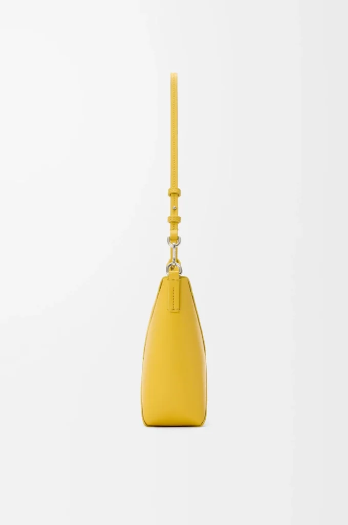Puzzle Fold pouch in shiny nappa calfskin Dandelion Puzzle Fold pouch in shiny nappa calfskin Dandelion