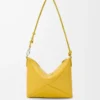 Puzzle Fold pouch in shiny nappa calfskin Dandelion Puzzle Fold pouch in shiny nappa calfskin Dandelion