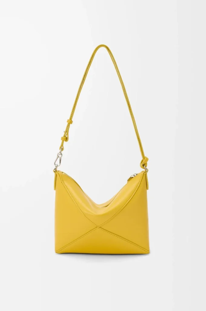 Puzzle Fold pouch in shiny nappa calfskin Dandelion Puzzle Fold pouch in shiny nappa calfskin Dandelion