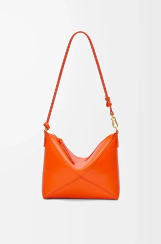 Puzzle Fold pouch in shiny nappa calfskin Vivid Orange Puzzle Fold pouch in shiny nappa calfskin Vivid Orange