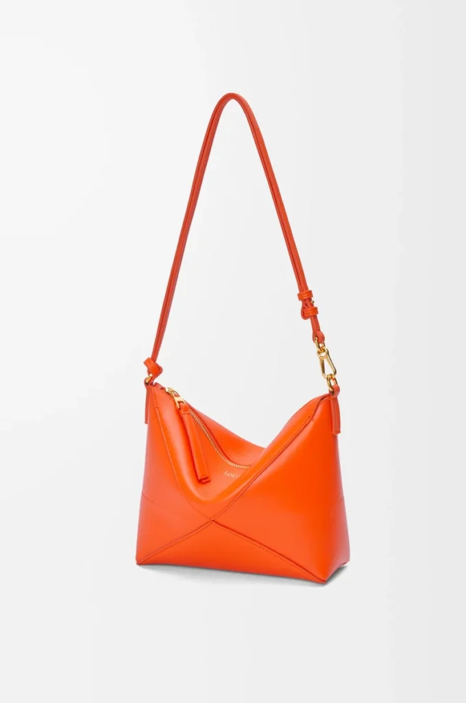 Puzzle Fold pouch in shiny nappa calfskin Vivid Orange Puzzle Fold pouch in shiny nappa calfskin Vivid Orange