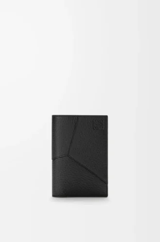 Puzzle passport cover in supple grained calfskin Black