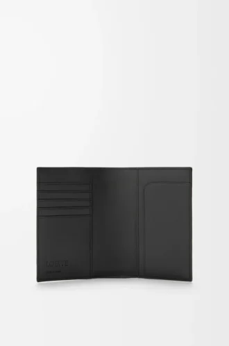 Puzzle passport cover in supple grained calfskin Black