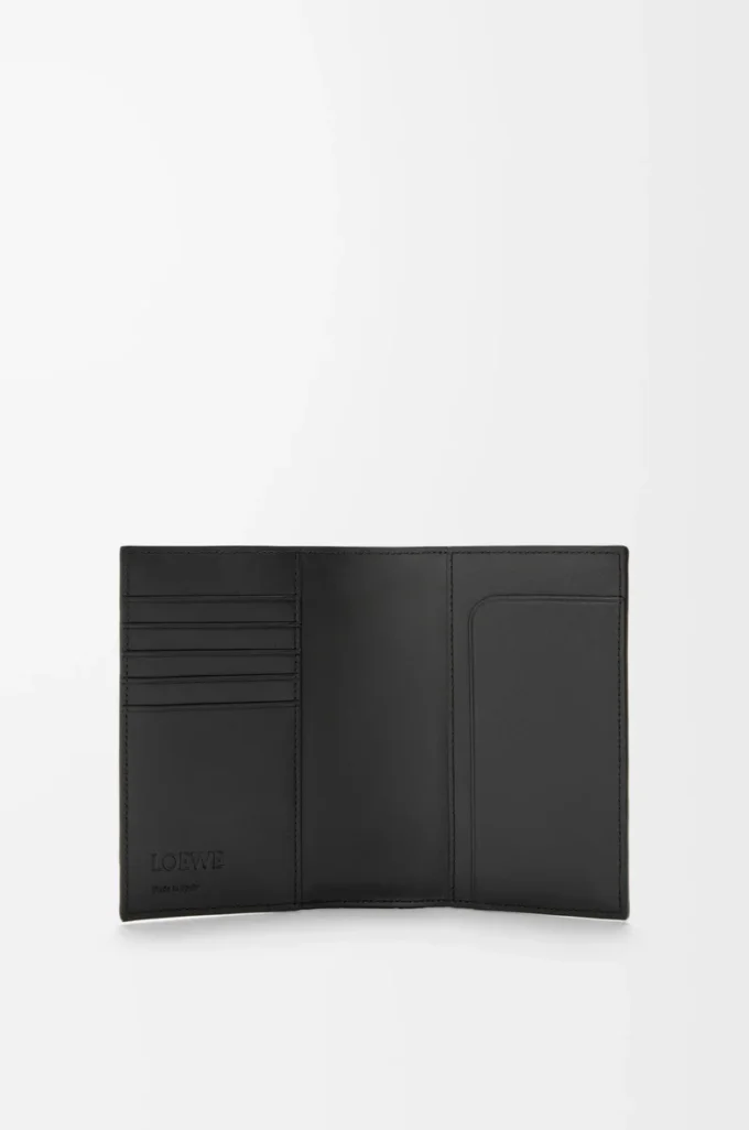 Puzzle passport cover in supple grained calfskin Black