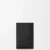 Puzzle passport cover in supple grained calfskin Black