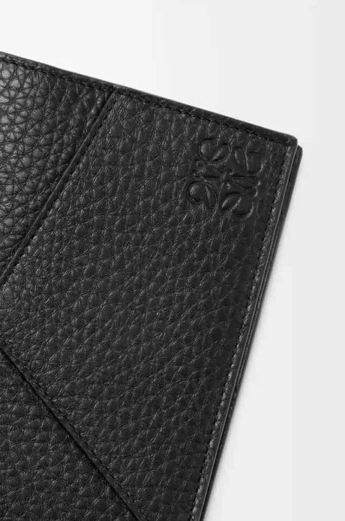 Puzzle passport cover in supple grained calfskin Black