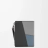 Puzzle slim compact wallet in classic calfskin Asphalt Grey/Storm Blue Puzzle slim compact wallet in classic calfskin Asphalt Grey/Storm Blue