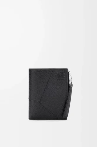 Puzzle slim compact wallet in supple grained calfskin Black
